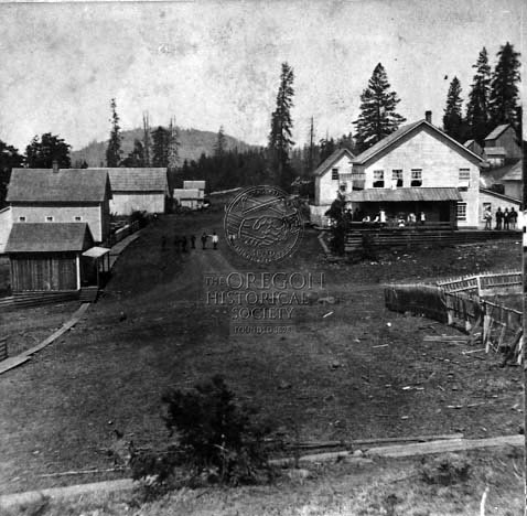 image-888866-LINE_OF_BOYS_WALK_7-ABREAST_DOWN_MAIN_STREET_IN_SODAVILLE,_PEOPLE_GATHER_ON_PORCH-c51ce.jpg